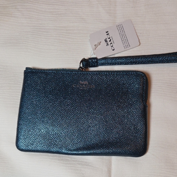 Coach Handbags - Coach Metallic Blue Wristlet